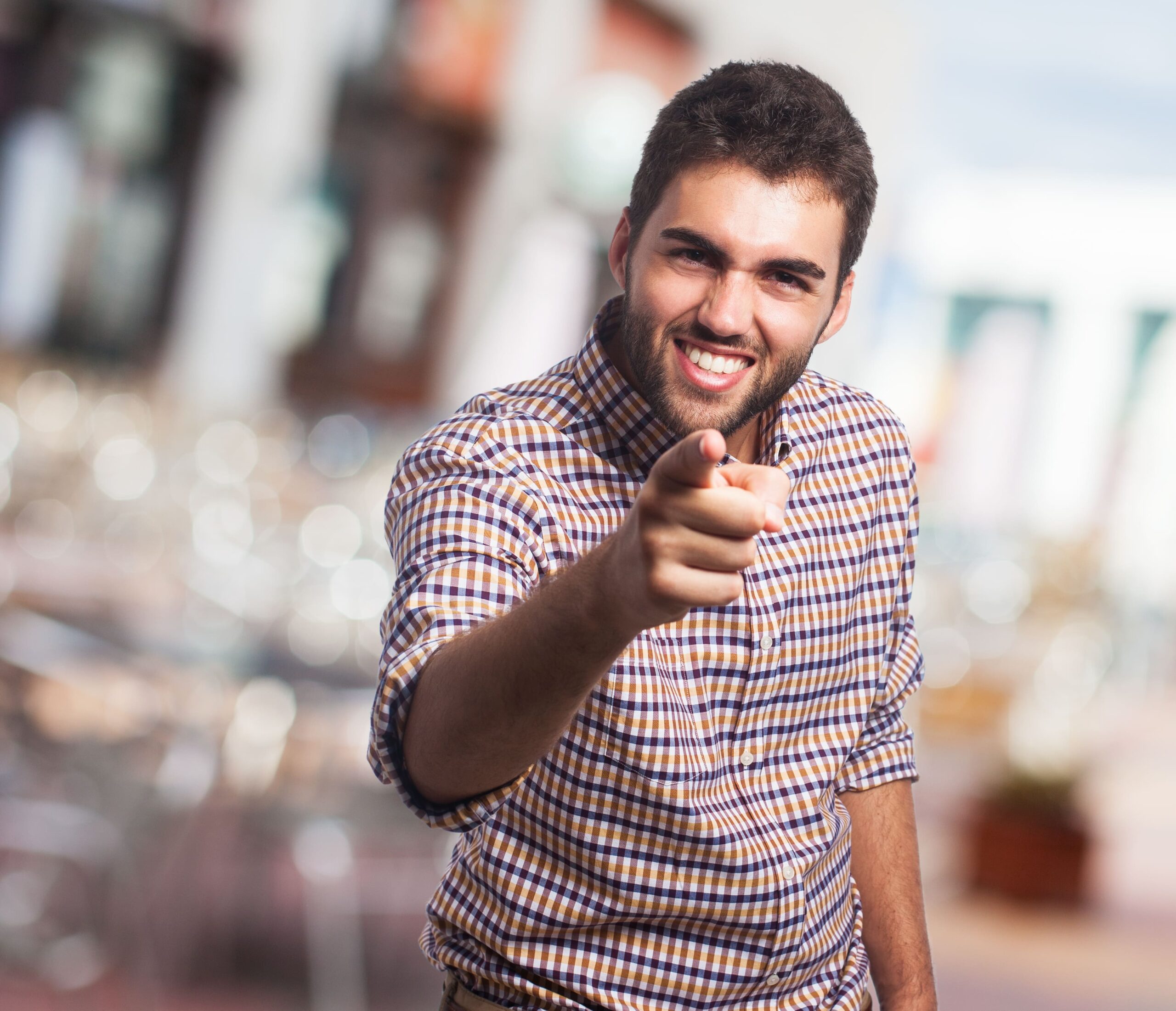 happy-arabic-man-pointing-camera